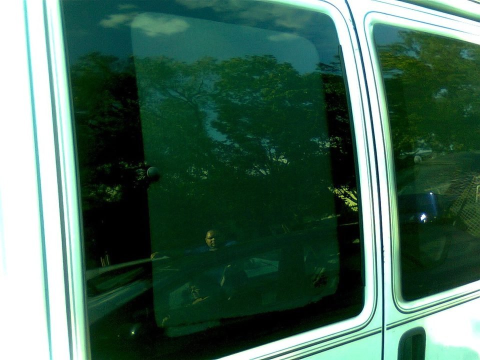 Dark tinted side window on a vehicle