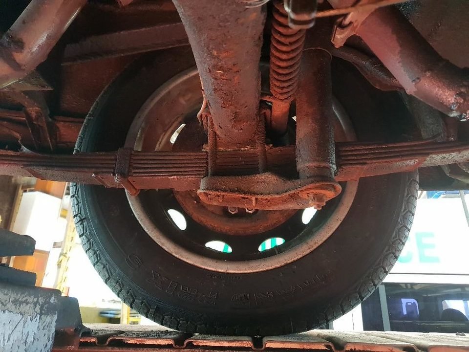 Underside view of a rear wheel and axle, where the rear wheel bearing sits